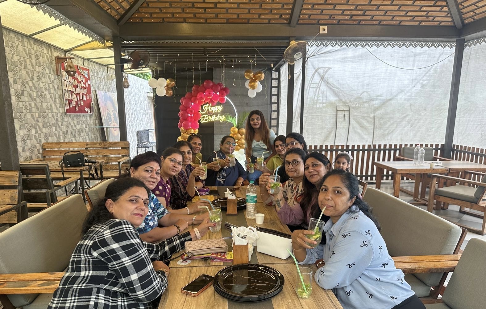 A group celebration at the long table